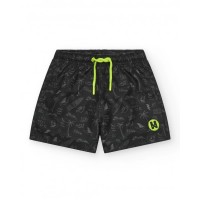 Black boy's swimsuit with a surfer print and fluorescent drawstring Black boy's swimsuit with a surfer print and fluorescent drawstring