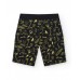 Boys' black Bermuda shorts with elastic waist and print 