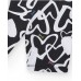 Girls' black cycling leggings with printed hearts and a studded waistband 