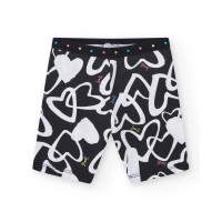 Girls' black cycling leggings with printed hearts and a studded waistband 