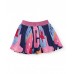 Girls pleated skirt with a multi-coloured print and shiny elastic waistband.