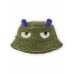 Green sheepskin hat for children with an embroidered face and 3D details 
