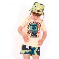 Boys' swim shorts with a green, black, and yellow print 