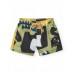 Boys' swim shorts with a green, black, and yellow print 