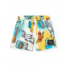 Boys' blue swim trunks with skateboards and the phrase "Be Free Skate" 