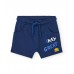 Boy's set with two t-shirts and blue shorts 