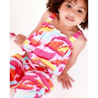 Pink top for girls with multicoloured print and bows on the straps  